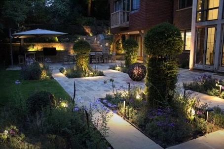 Landscape lighting in a backyard